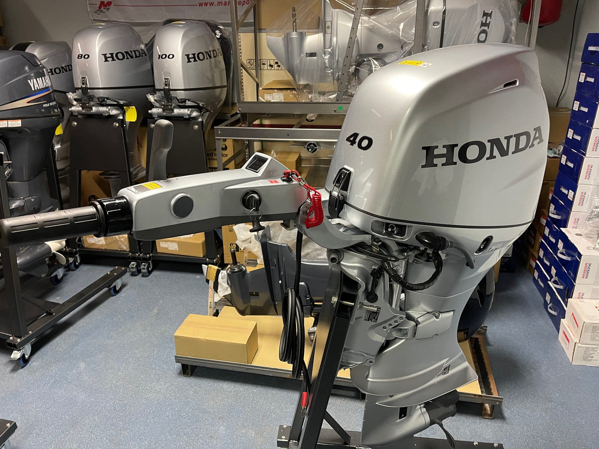 Honda 40 HP Long Shaft BF40 LRTZ including Tiller Handle Steering And Honda 40 HP Long Shaft BF40 LRTZ including Tiller Handle Steering And