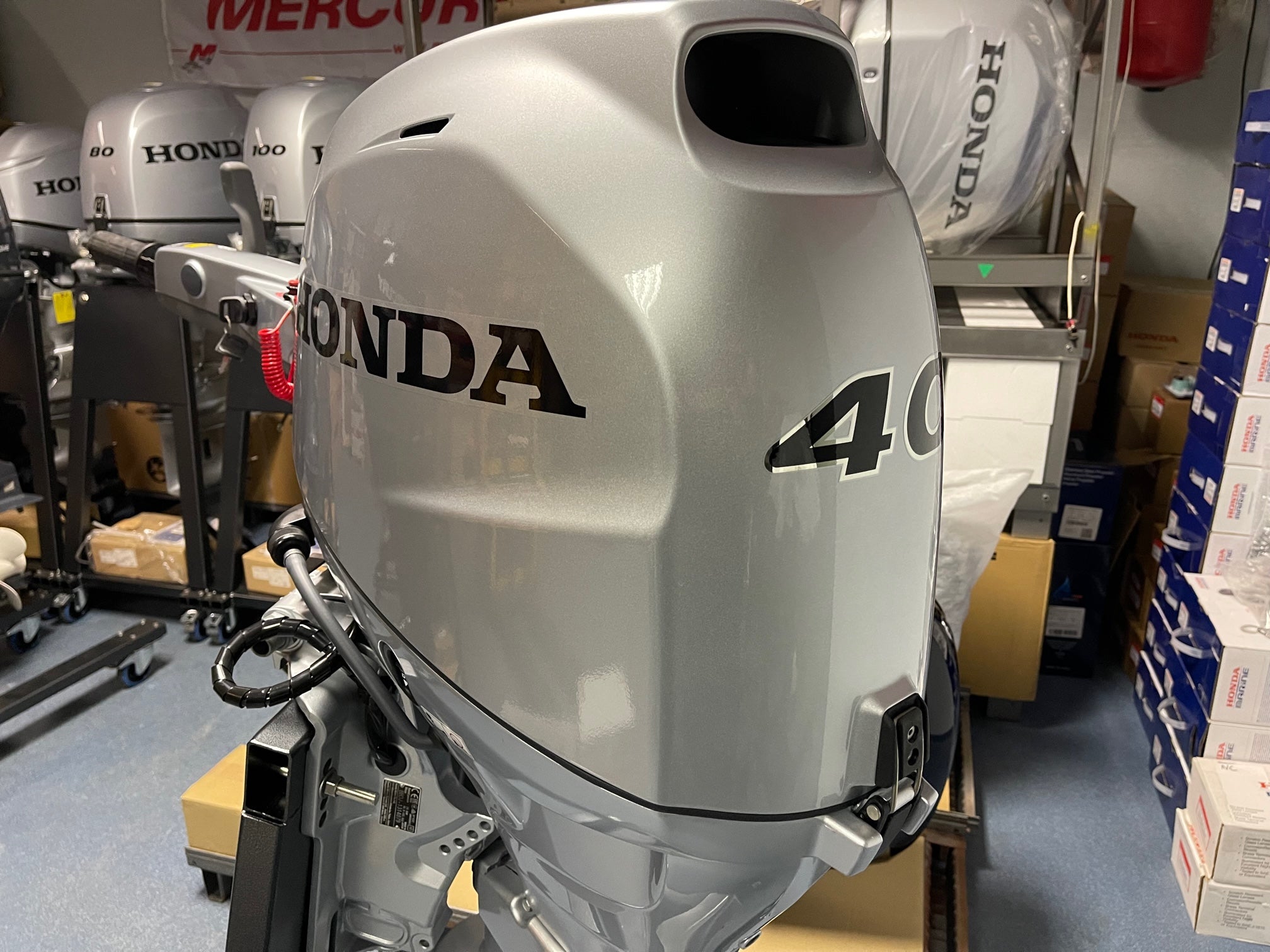 Honda 40 HP Long Shaft BF40 LRTZ including Tiller Handle Steering And Honda 40 HP Long Shaft BF40 LRTZ including Tiller Handle Steering And